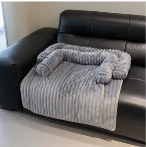 Detail view of a grey ribbed plush pet sofa mat with raised bolster edges for cozy comfort.