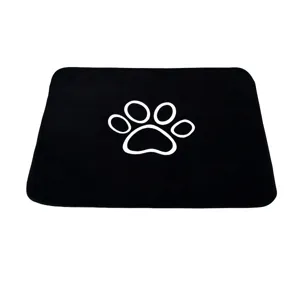 Black washable pet pee mat with white paw print, soft coral fleece reusable dog training pad.