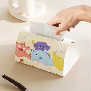 Modern leather tissue box holder with cute monster print for living room desktop decor.