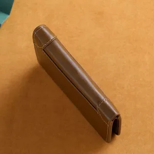 Men's brown leather bifold vertical wallet, classic design with fine stitching for daily use.
