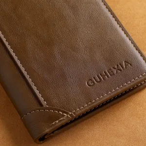 Close-up of premium men's bifold vertical genuine leather wallet with neat stitching details.