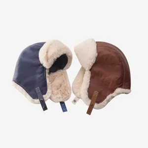 Winter faux leather bomber hat with thick plush earflaps, windproof and warm for cycling.