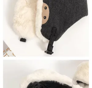 Thickened winter pilot bomber hat detail showing soft plush earflaps and adjustable strap.