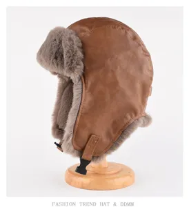 Vintage winter leather trapper hat with warm faux fur earflaps and windproof chin buckle.