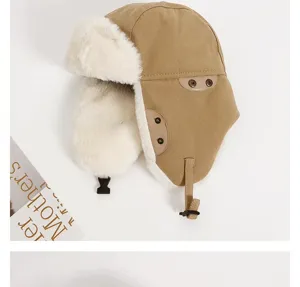 Winter khaki bomber hat with thick white faux fur lining, windproof ear flaps and buckle.