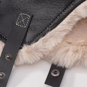 Detailed view of winter warm faux leather bomber hat with plush fleece lining and snaps.