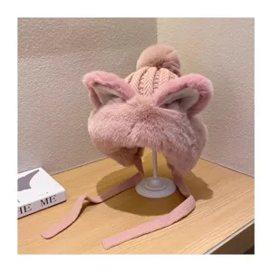 Cute plush cat ear winter knit hat with earflaps and pom pom, cozy fleece lined ushanka.