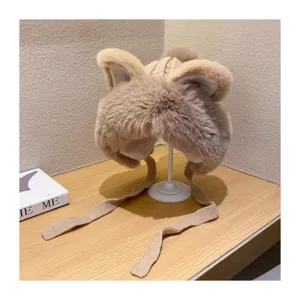 Winter warm fleece-lined ear-flap knitted hat detail, cute plush cat ear design style.