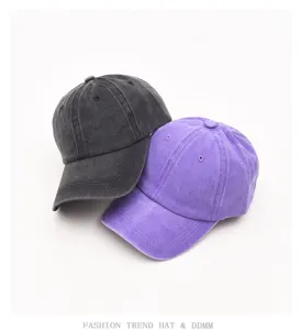 Vintage washed cotton baseball cap for men and women, casual soft top dad hat street style.