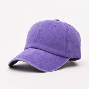 Unisex purple washed vintage baseball cap, classic dad hat with curved brim for casual wear.