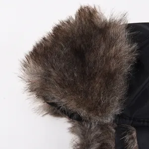 Winter warm bomber hat with soft brown faux fur and black waterproof fabric for outdoor skiing.