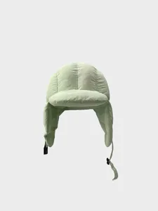 Lightweight quilted trapper hat for winter warmth with cozy earflaps and soft padded fabric.