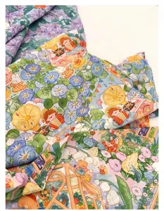 Detailed view of the French vintage Monet garden printed fabric bandana, showing cute floral patterns.