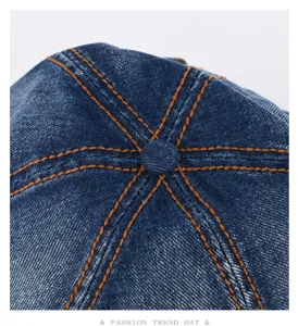 American retro washed denim cap detail, classic contrast orange stitching with top button.