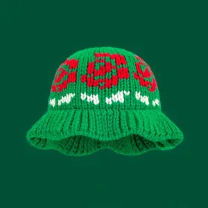Green knitted bucket hat with red floral pattern, warm winter wool hat for women stylish.