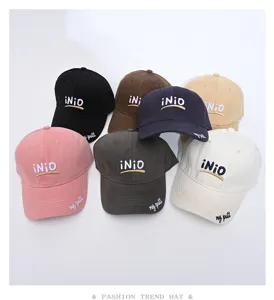 Detailed shot of multi-color embroidered baseball caps with wide brim and comfortable fit.
