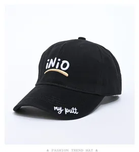 Black cotton baseball cap with custom embroidery, stylish sun protection hat for men and women.