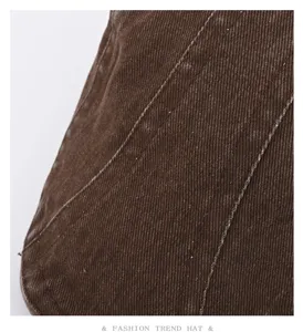 Detailed view of the American retro washed denim ivy hat fabric with durable stitching design.