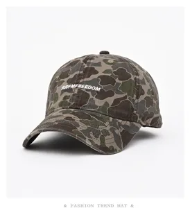 Camo baseball cap with embroidered lettering detail view, stylish streetwear cotton hat.