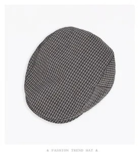 Detailed view of retro plaid ivy flat cap, classic pattern, premium texture for autumn wear.