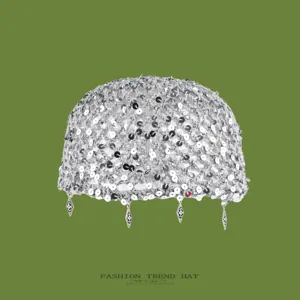 Retro hollow-out sequin crochet beanie hat for women, stylish silver knit skull cap.