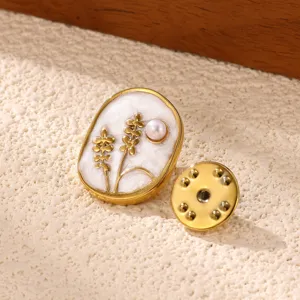 Close-up detail view of elegant 18k gold plated flower pearl brooch stainless steel item