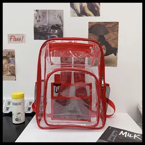 Clear red PVC backpack detail shot showing transparent compartments and sturdy zippers.