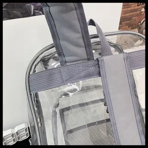 Close-up of transparent PVC backpack straps and durable gray webbing detail for daily use.