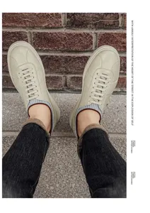 Detailed shot of retro casual men's sneakers with soft sole and stylish socks design.