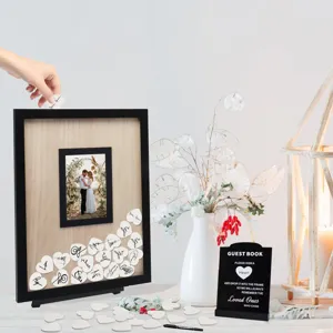 Wooden wedding drop top guest book frame with heart tokens and sign for party decor.
