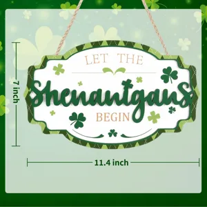 St. Patrick's Day wooden hanging sign with green shamrock patterns and jute rope.