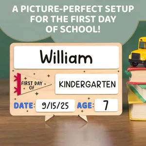 Custom wooden first day of school sign detail showing name and grade cards setup.