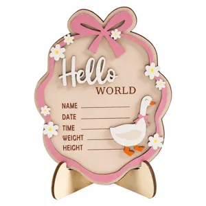 Wooden baby birth milestone plaque with pink bow and cute duck design for newborn gifts.