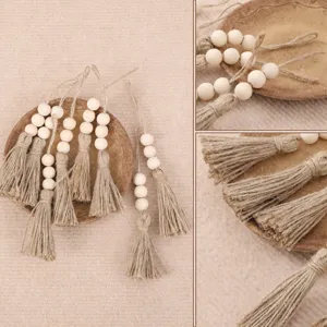 Wooden bead jute rope tassel decorative hanging detail close-up view showing craftsmanship.