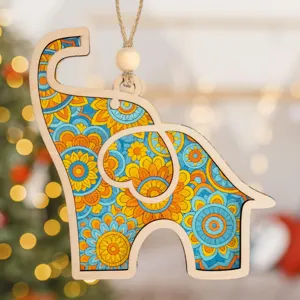 Detailed view of the wooden elephant hanging ornament with colorful mandala floral patterns.
