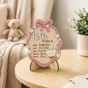 Wooden baby birth milestone plaque with pink bow and cute duck design for newborn gift.