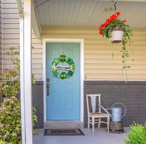 St Patrick Day wooden clover door sign scene display, hanging welcome wreath decoration.