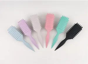 Detail shot of multi-color professional hair styling teaser brushes with tail handle design.