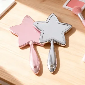 Portable star-shaped hand mirror for daily makeup use, cute dual color vanity mirror with handle.
