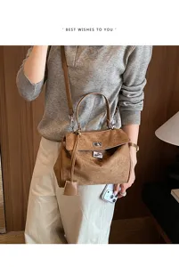 Textured brown suede women handbag, stylish top handle shoulder messenger bag for daily use.