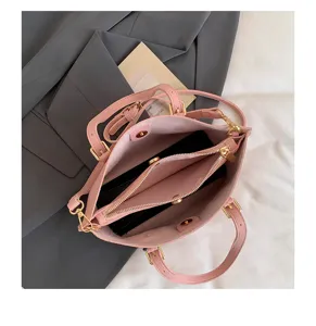Bolso tote rosa de piel para mujer, bolso de hombro de gran capacidad para viajeras.