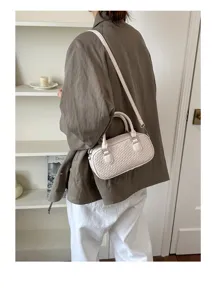 Woven texture shoulder bag detail, retro style mini handbag with comfortable crossbody strap.