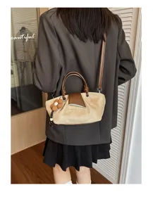 Vintage suede handbag for women, chic shoulder crossbody tote bag with stylish design.