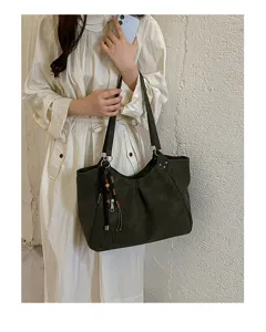 Dark green large capacity tote bag, minimalist women's shoulder bag with chic tassel charm.
