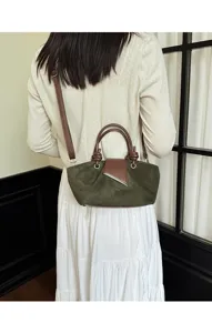 Vintage suede shoulder bag for women, elegant crossbody tote with knot handles and flap.