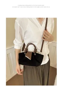 Retro niche suede handbag for women, minimalist black and brown crossbody tote bag detail.