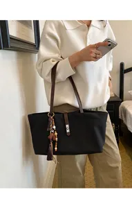 Black canvas tote bag for women large capacity shoulder bag retro casual handbag with tassel