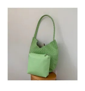Light green woven shoulder bag detail, stylish PU leather hobo handbag with matching pouch.