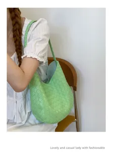 Summer large capacity woven underarm bag for women, stylish green single shoulder bucket bag.