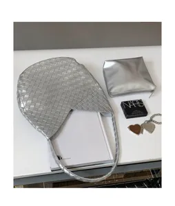 Silver woven shoulder bag for women, large capacity stylish underarm tote and hobo handbag.
